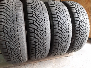 Шини на авто в хорошому стані Bridgestone Blizzak LM-005 шириною 215 висотою 70 радіусом R 16 низькі ціни
