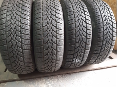 Шини на авто в хорошому стані Dunlop Winter Response-2 шириною 185 висотою 65 радіусом R 15 низькі ціни